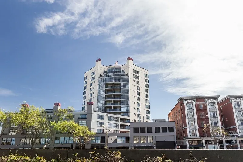 Photograph of Webster Tower & Terrace’s tower and street frontage